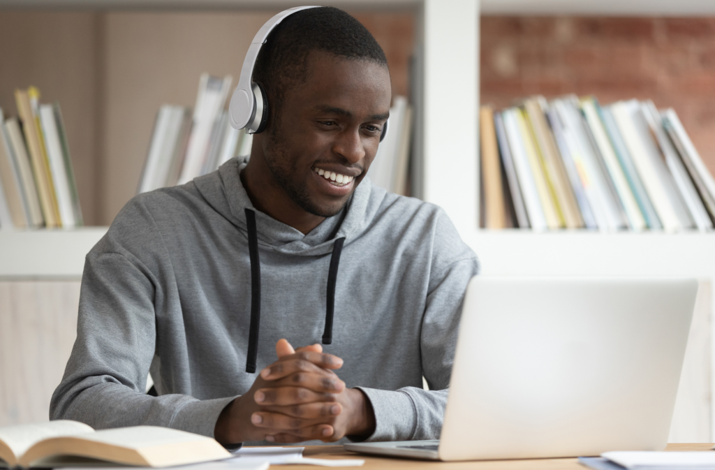 Man learning an online course